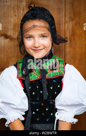 Portrait of young girl in tradtional Protestant folk costume, Black Forest Open Air Museum Vogtsbauernhof, Gutach, Black Forest, Baden-Wurttemberg, Germany Stock Photo