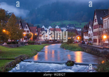 Germany, Baden-Wurttemburg, Black Forest, Schiltach, town view along the riverfront, dawn Stock Photo