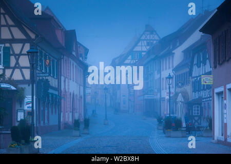 Germany, Baden-Wurttemburg, Kaiserstuhl Area, Endingen, Hauptstrasse, Main street, dawn, fog Stock Photo