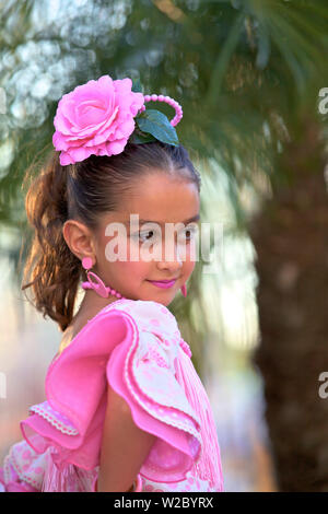 Small Girl in Traditional Spanish Costume, Jerez de la Frontera, Cadiz Province, Andalusia, Spain Stock Photo