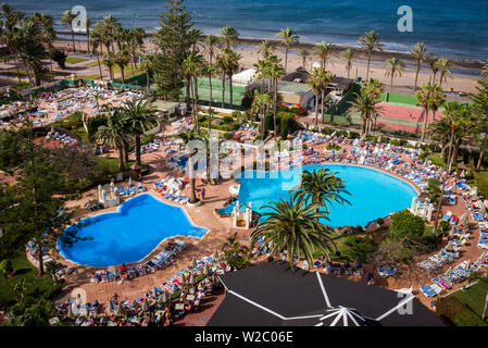Spain, Canary Islands, Tenerife, Playa de Las Americas, H10 Las Palmeras Hotel, elevated pool view Stock Photo