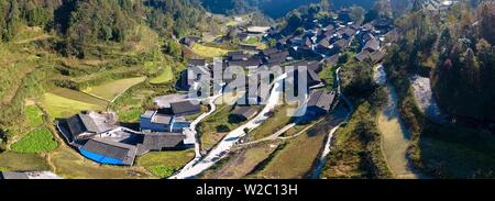 (190708) -- BEIJING, July 8, 2019 (Xinhua) -- Aerial photo taken on Nov. 8, 2017 shows a residential dwelling cluster at Shibadong Village of Huayuan County, central China's Hunan Province. Located in central China, Hunan Province is well-known for its varied topography. It abuts the Dongting Lake to the north, and the east, south and west sides of the province are surrounded by mountains, with Wuling and Xuefeng Mountains to the west, Nanling Mountain to the south, Luoxiao and Mufu Mountains to the east. The Xiangjiang, Zijiang, Yuanjiang and Lishui Rivers converge on the Yangtze River at the Stock Photo