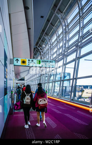 Tokyo, Japan - May 8, 2019: Travellers exit from aircraft and enter the Haneda Airport  terminal when arriving at Tokyo Haneda Airport International T Stock Photo