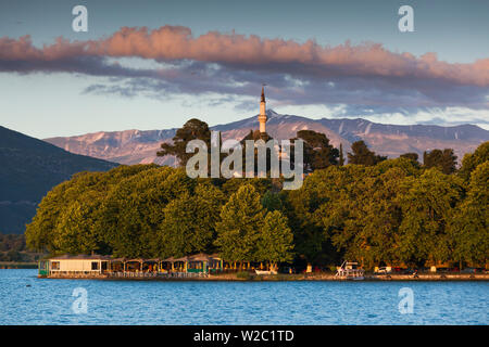 Greece, Epirus Region, Ioannina, Municipal Ethnographic Museum building and Lake Pamvotis, sunset Stock Photo