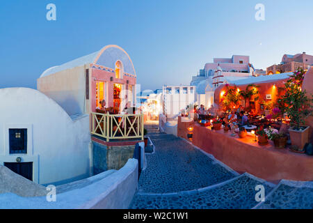 Restaurants in the village of Oia (La), Santorini (Thira), Cyclades Islands, Aegean Sea, Greece, Europe Stock Photo
