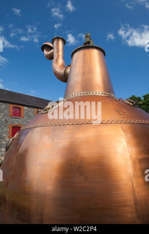 Ireland, County Cork, Midleton, Jameson Irish Whiskey Distillery, massive copper distilling kettle Stock Photo