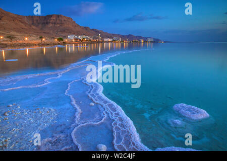 Salt Deposit In Foreground Looking Towards Ein Bokek, Ein Bokek, Dead Sea (lowest place on earth), Israel Stock Photo