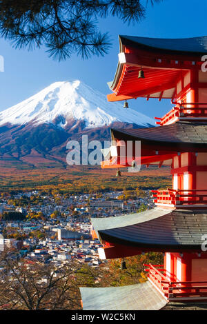 Japan, Central Honshu (Chubu), Fuji-Hakone-Izu National Park, Mount Fuji capped in snow and the upper levels of a temple Stock Photo