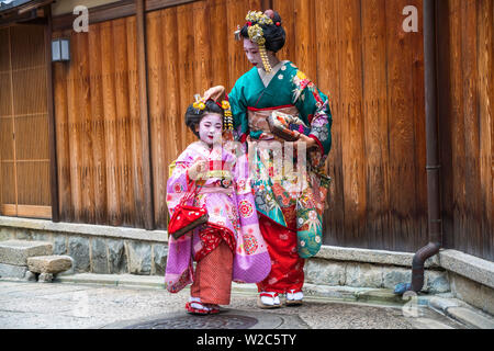 Woman & child dressed in traditional geisha dress, Kyoto, Japan Stock Photo