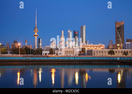 Kuwait, Kuwait City, City skyline reflecting in  harbour Stock Photo