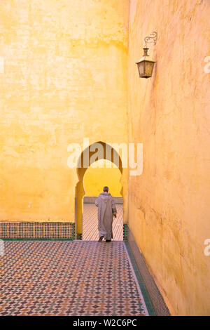 Man In Courtyard, Interior Of Mausoleum of Moulay Ismail, Meknes, Morocco, North Africa Stock Photo