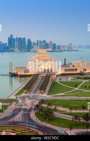 Qatar, Doha, Traffic at roundabout infont of the Museum of Islamic Art at night Stock Photo
