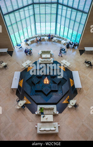 Qatar, Doha, The Museum of Islamic Art, designed by I.M. Pei, atrium, elevated interior view of window to Doha Bay Stock Photo