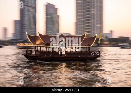 Hotel shuttle boat on the Chao Phraya River outside the Mandarin Oriental, Bangkok, Thailand Stock Photo