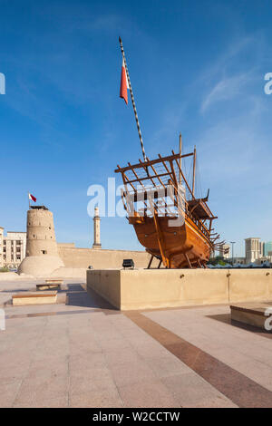 UAE, Dubai, Bur Dubai, Dubai Museum, exterior with traditional Dhow ship Stock Photo