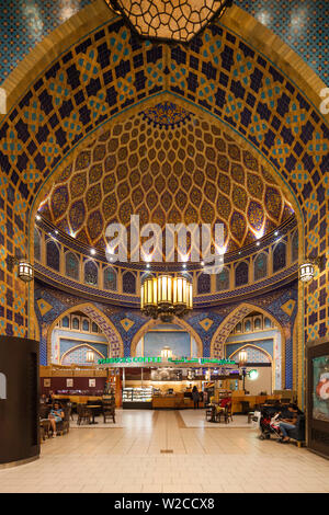 UAE, Dubai, Western Dubai, Ibn Battuta Mall, shopping mall built with six courts representing voayages by 14th century Arab explorer, Ibn Battuta, Persian Court with Starbucks coffee shop Stock Photo