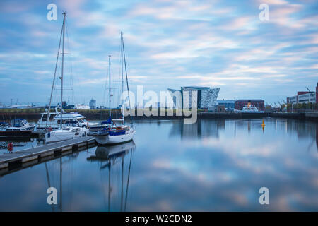 United Kingdom, Northern Ireland, Belfast, View of the Titanic Belfast museum and The SS Nomadic Stock Photo