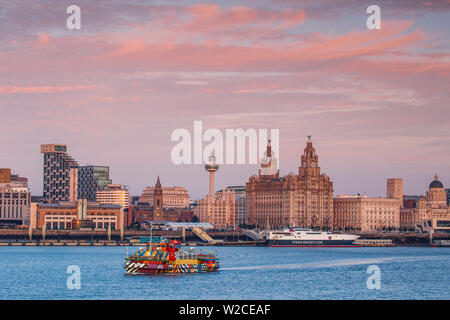 United Kingdom, England, Merseyside, Liverpool,  Mersey ferry and Liverpool skyline - the only Dazzle ship in the UK Stock Photo