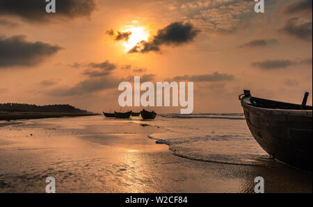 Silhouette Boats anchored on the sea Beach at Digha beach. Stock Photo