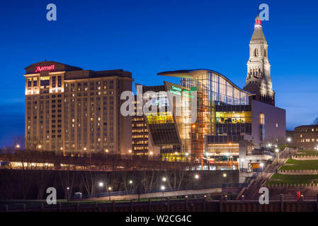 USA, Connecticut, Hartford, city skyline with Connecticut Science Center and Travelers Building, from the Connecticut River, dusk Stock Photo