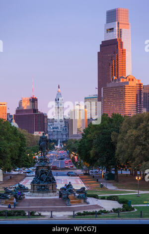 USA, Pennsylvania, Philadelphia, city skyline from the Benjamin Franklin Parkway, dusk Stock Photo