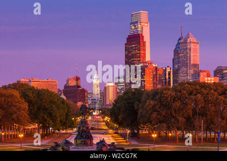 USA, Pennsylvania, Philadelphia, city skyline from the Benjamin Franklin Parkway, dusk Stock Photo