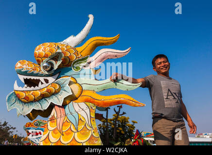 Vietnam, Hue, dragon excursion boats, Perfume River, with people Stock Photo