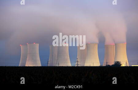 Nuclear power plant by night Stock Photo
