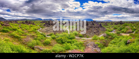 Dimmuborgir lava fields near Myvatn in Iceland. Amazing nature landscape, panoramic view of popular tourist attraction - green valley, rock formations Stock Photo