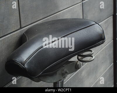 black bicycle saddle with springs close-up Stock Photo