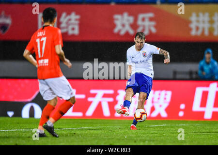 Brazilian football player Roger Krug Guedes, known as Roger Guedes, of Shandong Luneng Taishan shots the ball against Beijing Renhe in their 16th round match during the 2019 Chinese Football Association Super League (CSL) in Beijing, China, 7 July 2019. Shandong Luneng Taishan defeated Beijing Renhe 2-0. Stock Photo