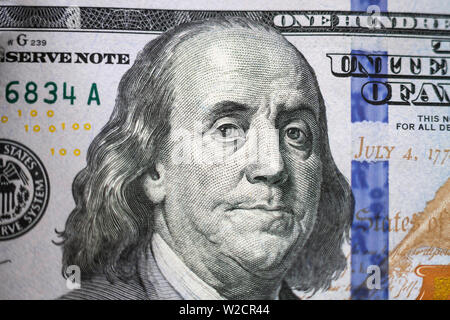 Benjamin Franklin portrait look on 100 dollar paper banknote. One hundred dollars bill closeup Stock Photo