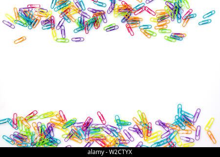 Colorful paper clips isolated on white background with copy space. Back to school concept Stock Photo