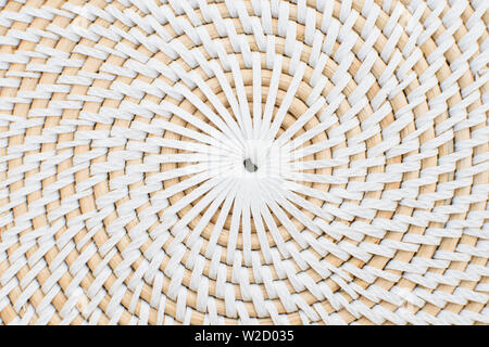 Close up view of the circular straw surface. Circular white shapes. Textured surface with circles. Stock Photo