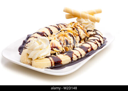 ice cream sundae: A banana split with ice cream cones isolated on white background Stock Photo