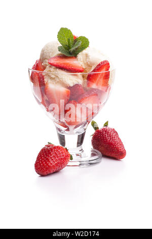 ice cream sundae: A strawberry sundae with two strawberries on neutral background Stock Photo