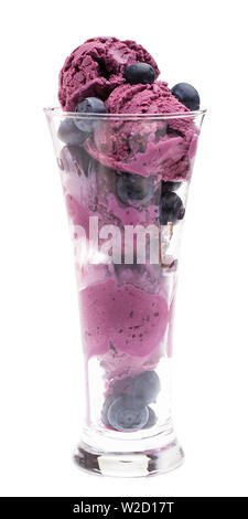 ice cream sundae: Blueberry ice cream and berries in a glass isolated on white background Stock Photo