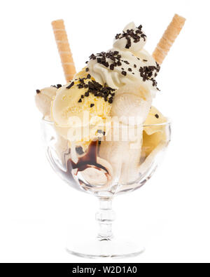 ice cream sundae: banana ice cream sundae with cream and waffles isolated on white background Stock Photo