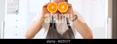 Chef Vlogger Showing Comic Orange Citrus Eye Stock Photo