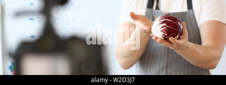 Male Vlogger Hands Holding Purple Organic Cabbage Stock Photo