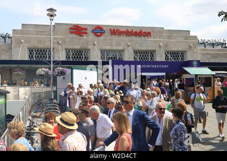 Wimbledon, London. UK. 8th July 2019. Large crowds arrive at Wimbledon station to attend the matches at the All Enngland Tennis Club  on the second Monday which is also referred to as Manic Monday as it is the busiest day of the Wimbledon Championships with the last 16 matches taking place  for  men's and Ladies 's singles of the tennis tournament . Credit: amer ghazzal/Alamy Live News Stock Photo