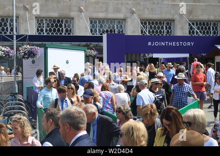 Wimbledon, London. UK. 8th July 2019. Large crowds arrive at Wimbledon station to attend the matches at the All Enngland Tennis Club  on the second Monday which is also referred to as Manic Monday as it is the busiest day of the Wimbledon Championships with the last 16 matches taking place  for  men's and Ladies 's singles of the tennis tournament . Credit: amer ghazzal/Alamy Live News Stock Photo