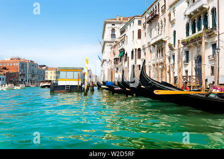 Black gondolas near vaporetto stop in Venice Stock Photo