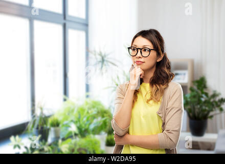 asian woman in glasses or student at home Stock Photo