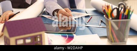 Two Engineer Architect Discussing House Project Stock Photo