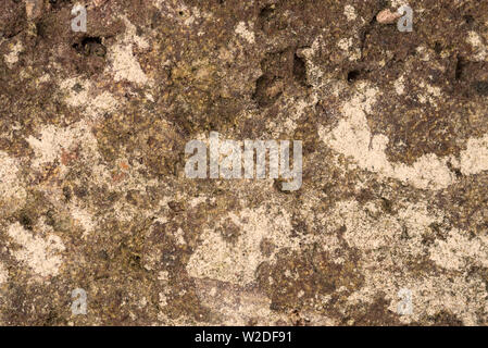 Close up of the mottled surface pattern and texture of handmade bricks. Stock Photo