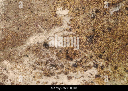 Close up of the mottled surface pattern and texture of handmade bricks. Stock Photo