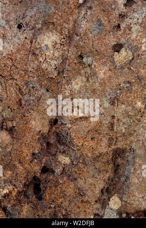 Close up of the mottled surface pattern and texture of handmade bricks. Stock Photo