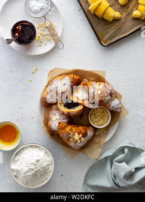 Fresh croissants with chocolate on a white background top view Stock Photo