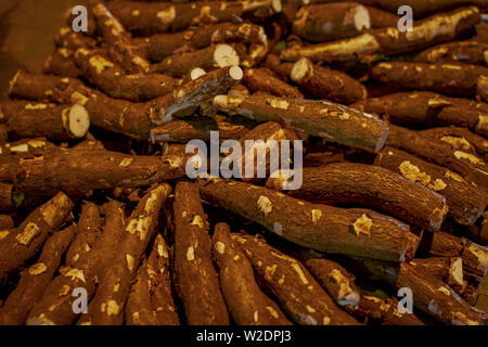 A stack cassavas in traditional market Stock Photo
